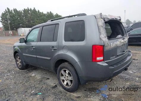 2011 Honda Pilot Touring z USA, uszkodzony, nr VIN 5FNYF4H92BB035672